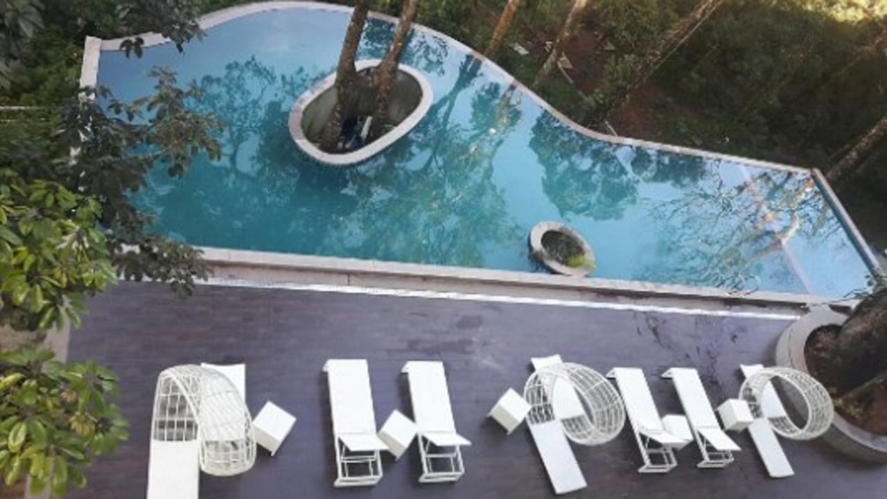 Elixir Hills Suites Resort And Spa Муннар Экстерьер фото